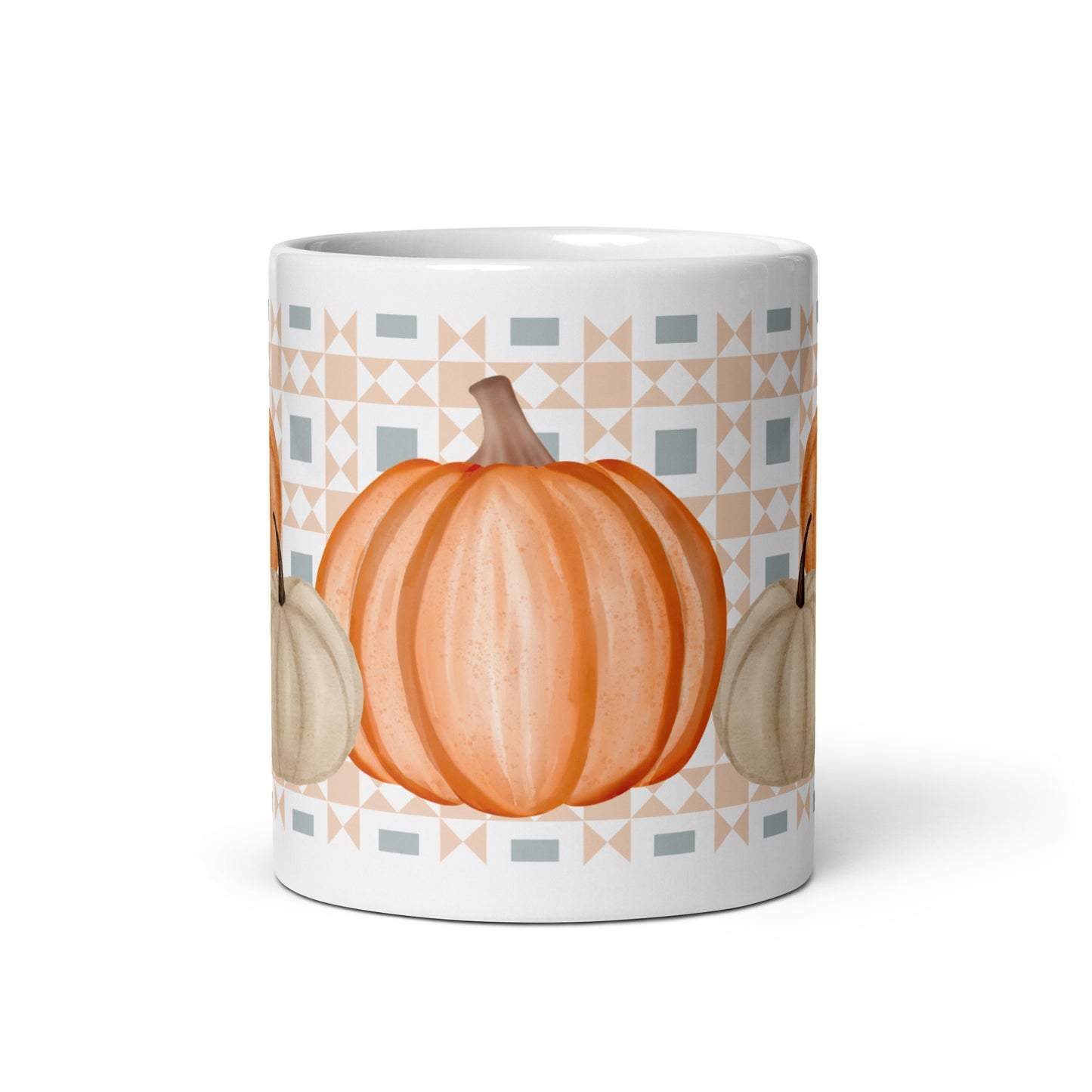 White mug with pumpkins and geometric pattern on a white background