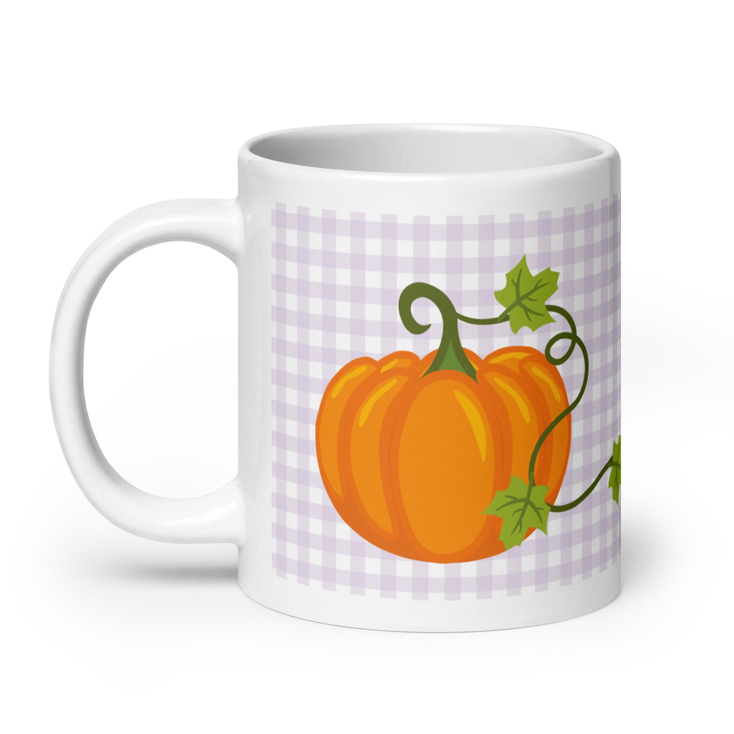 White mug with a pumpkin design on a purple checkered background