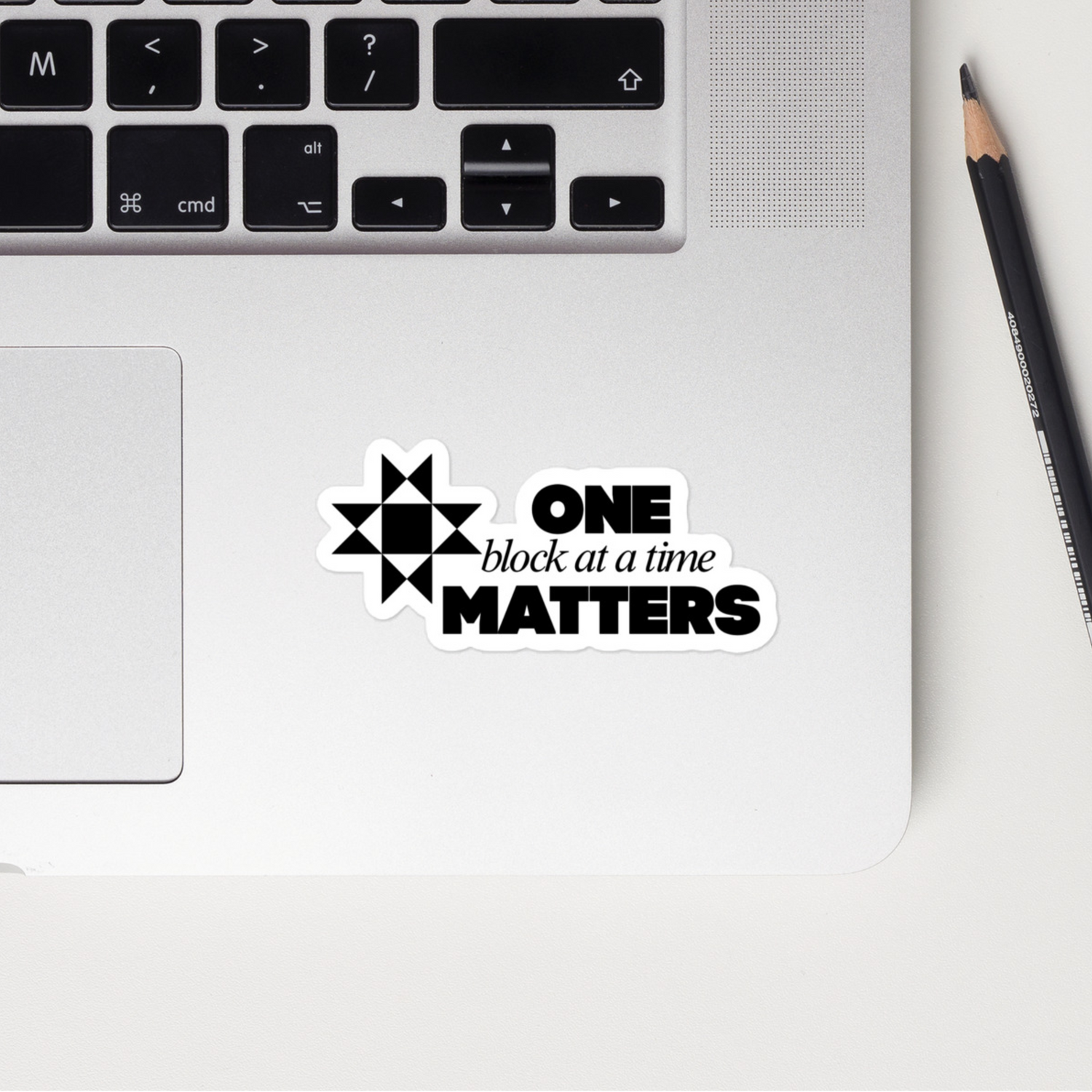 Vinyl sticker with quilt block design and quote “One Block at a Time Matters” – inspirational quilting and sewing decal for makers