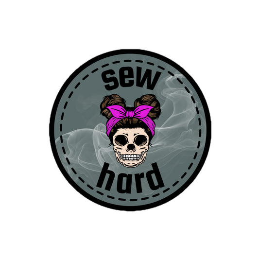 Sew Hard vinyl sticker with skull design featuring pigtail buns, pink bow, and smoky sage green background – sewing decal gift for quilters
