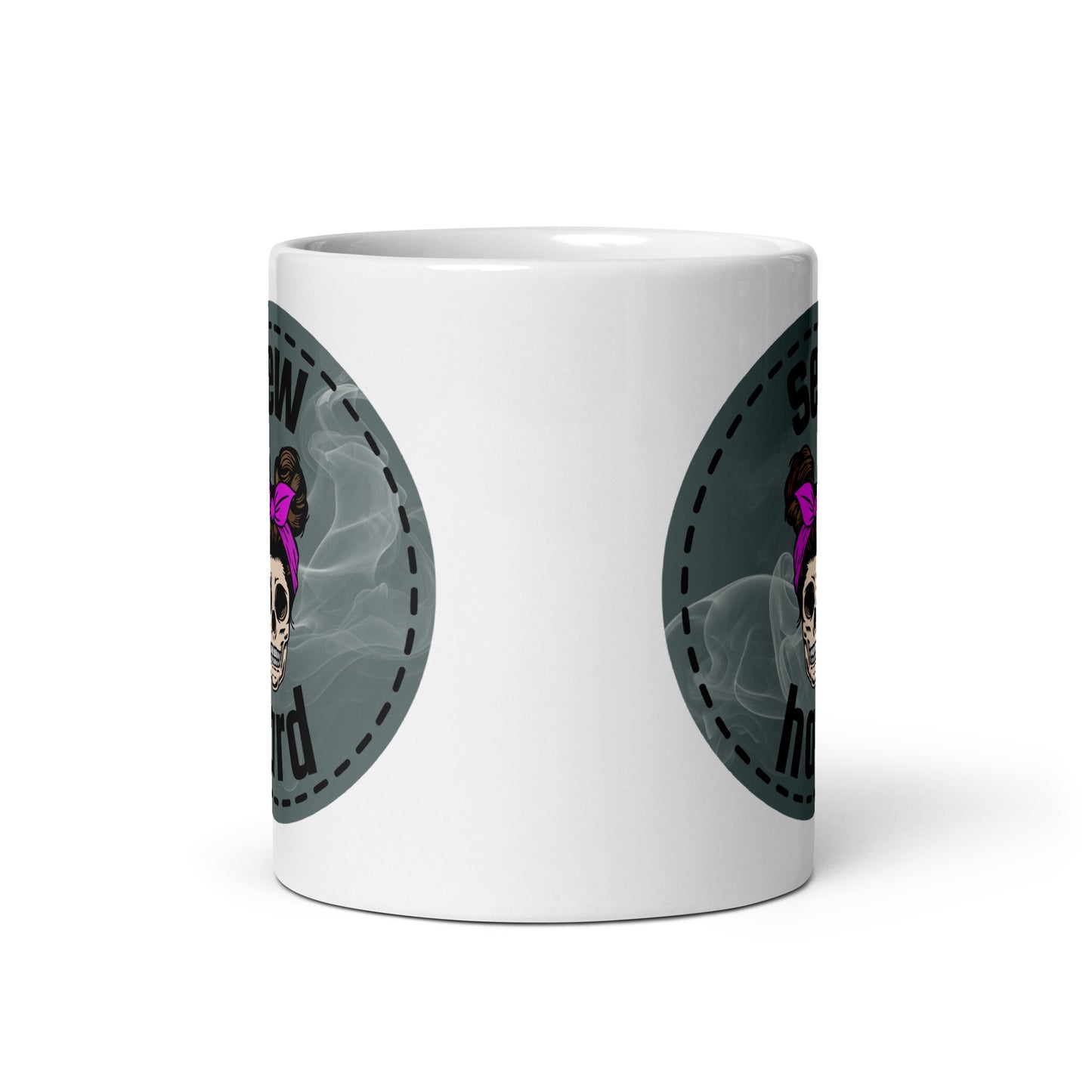 White ceramic mug with Sew Hard skull design featuring pigtail buns, pink bow, and smoky sage green background – sewing gift for quilters and sewists