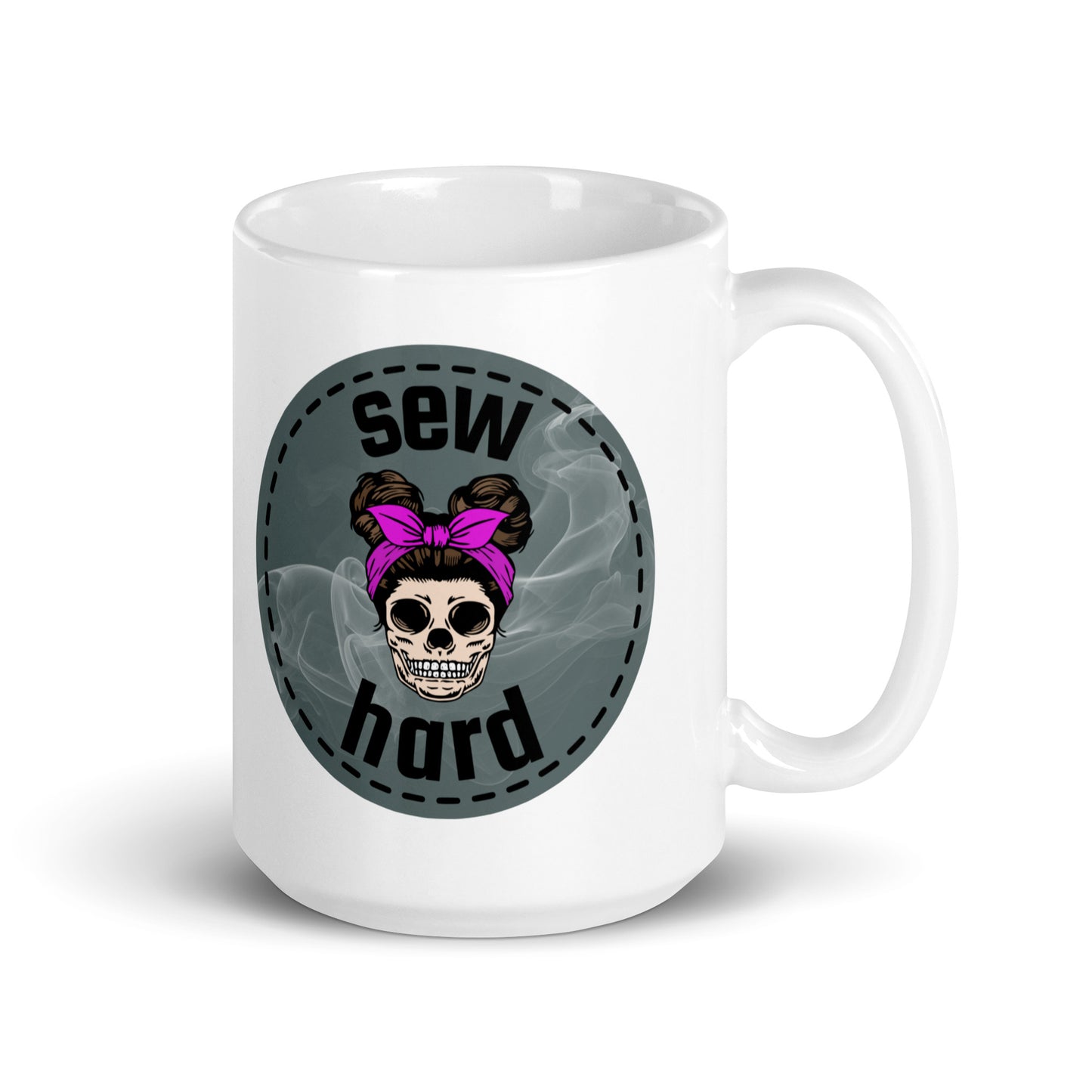 White ceramic mug with Sew Hard skull design featuring pigtail buns, pink bow, and smoky sage green background – sewing gift for quilters and sewists