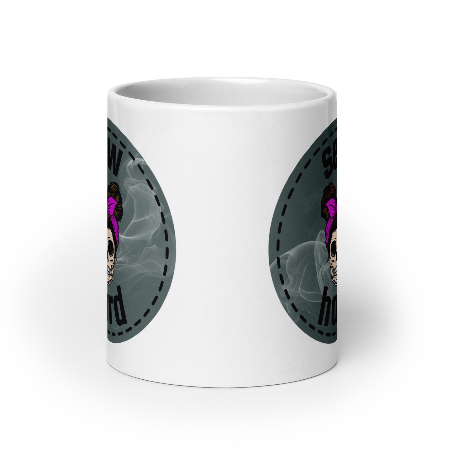 White ceramic mug with Sew Hard skull design featuring pigtail buns, pink bow, and smoky sage green background – sewing gift for quilters and sewists