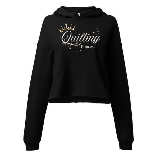 Women’s cropped hoodie with “Quilting Princess” text and crown over the Q – cozy sewing apparel gift for quilters and sewists
